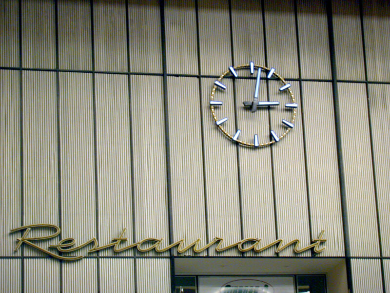Neon-Lettering 'Restaurant' and Clock at Airport Tempelhof Berlin