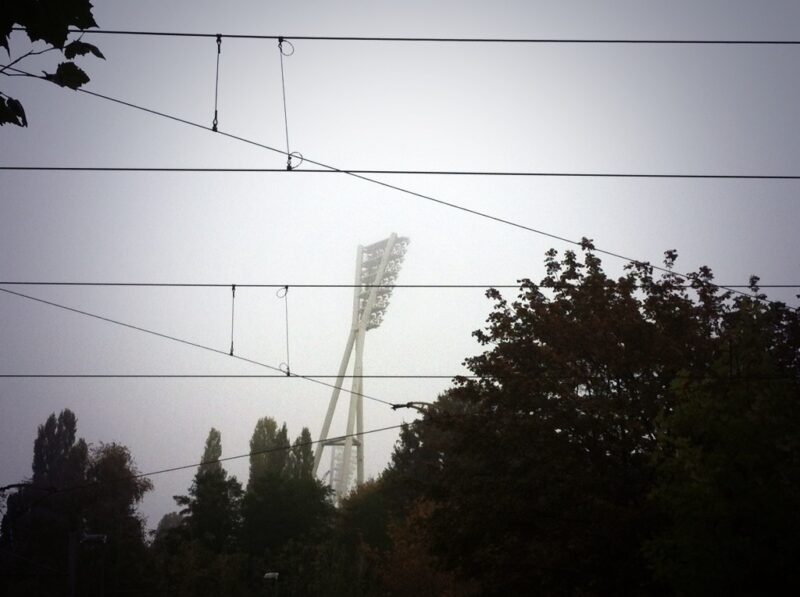 Early morning fog and floodlights at Mauerpark
